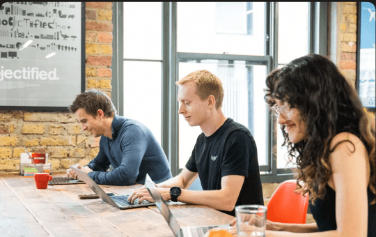 Forge team members working together in the Shoreditch office